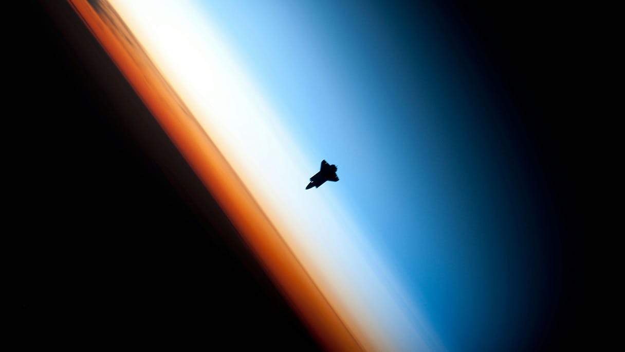 Space ship entering orbit